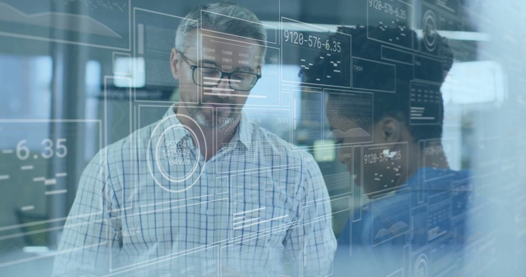 Business Colleagues Analyzing Digital Data Visuals