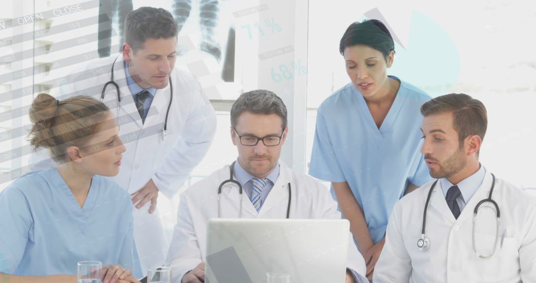 Multicultural Doctors Using Laptop with Overlay of Medical Data