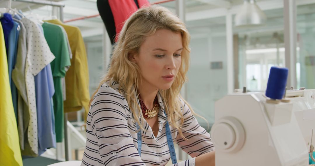 Young Fashion Designer Using Sewing Machine in Studio - Free Images, Stock Photos and Pictures on Pikwizard.com