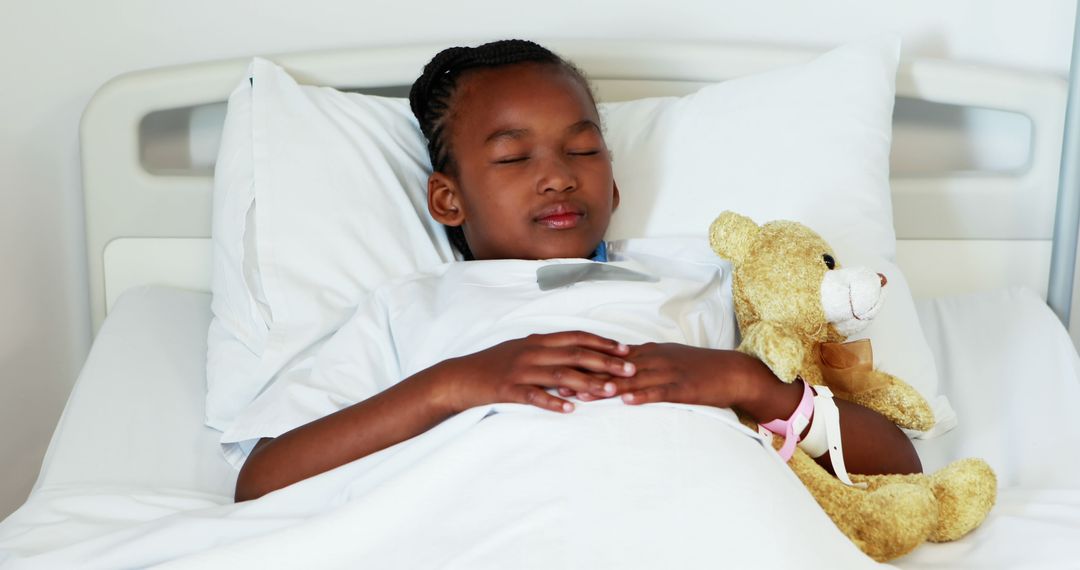 African American Girl Resting in Hospital Bed with Teddy Bear - Free Images, Stock Photos and Pictures on Pikwizard.com