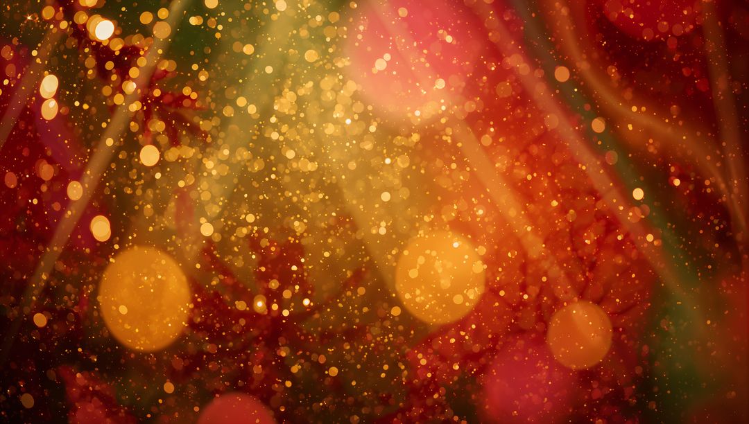 Shimmering Golden and Red Bokeh Backdrop with Sparkling Glitter and Warm Glow