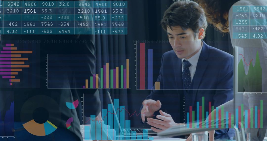 Business Team Collaborating with Financial Data Visualizations