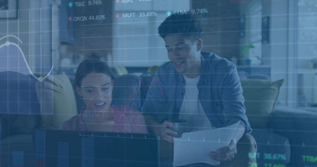 Couple Analyzing Finances with Stock Market Data Digital Overlay