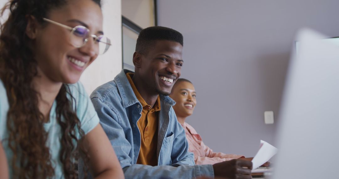 Happy Diverse Creative Colleagues Collaborating in Office Meeting