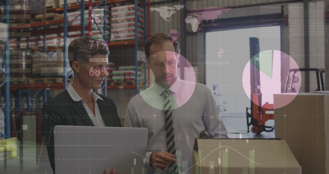 Caucasian Business Colleagues Analyzing Digital Data in Warehouse