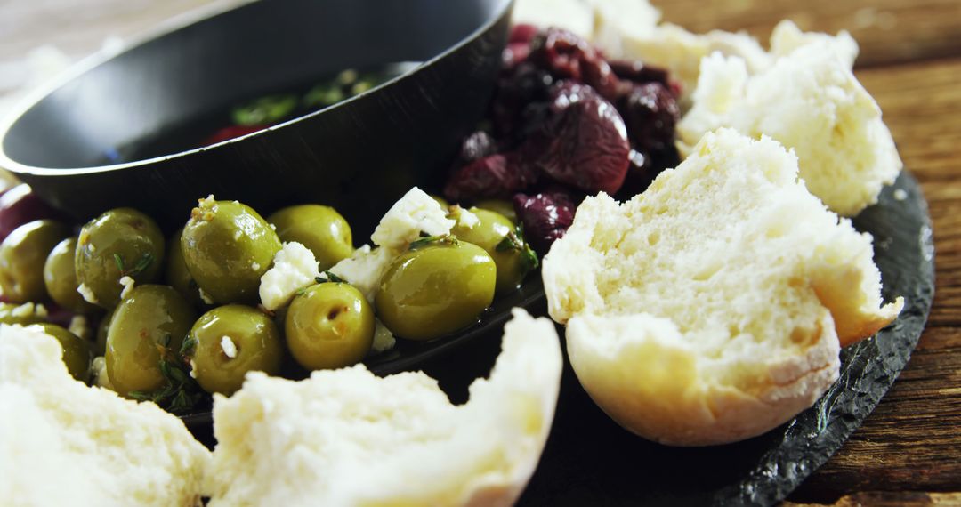 Mediterranean Appetizer Plate with Olives, Bread, and Tapenade - Free Images, Stock Photos and Pictures on Pikwizard.com