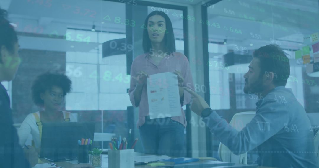 Business Team Analysing Financial Data on Transparent Screen