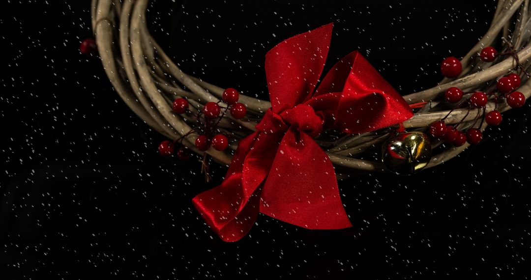 Festive Wreath with Red Bow and Falling Snowflakes
