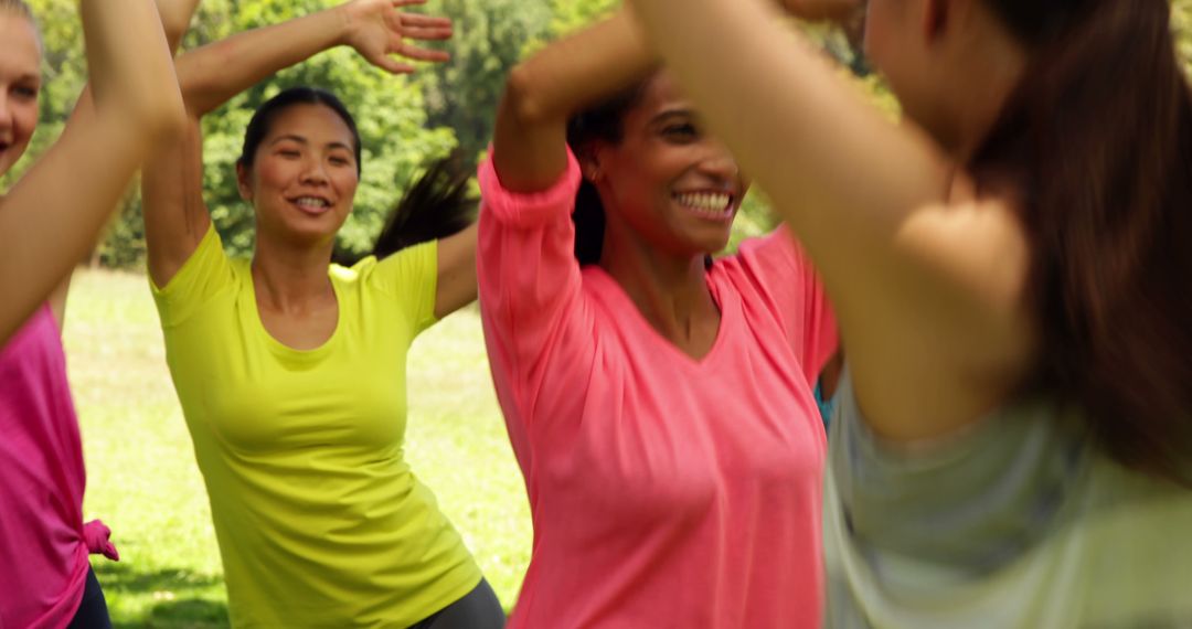 Diverse Group of Women Exercising Outdoors in Park - Free Images, Stock Photos and Pictures on Pikwizard.com