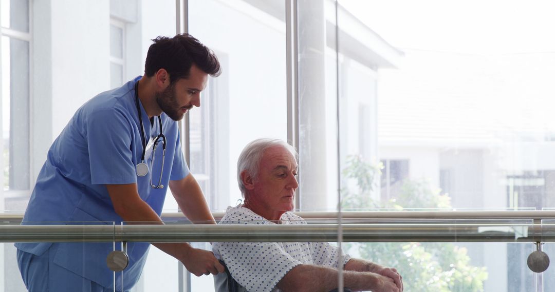 Healthcare Worker Assisting Elderly Patient in Wheelchair - Free Images, Stock Photos and Pictures on Pikwizard.com