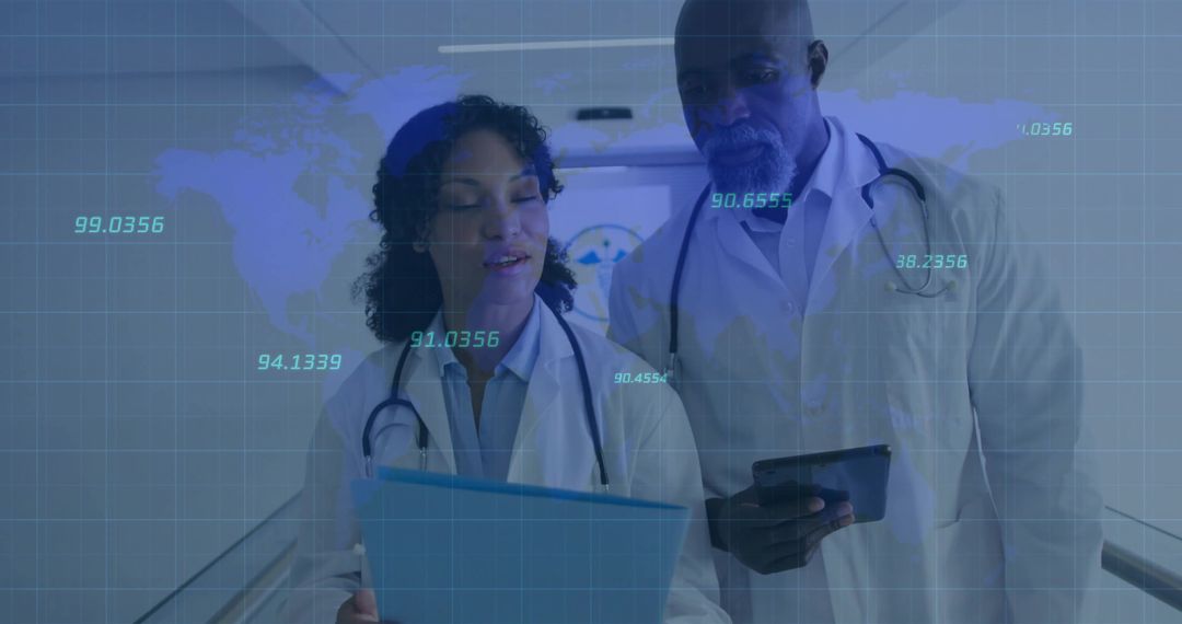 Doctors Reviewing Medical Data on Clipboard and Tablet in Corridor