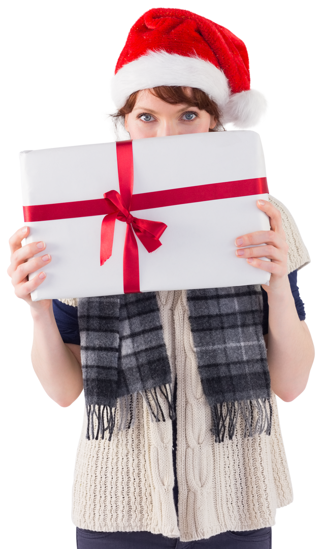 Woman Wearing Santa Hat Holding Christmas Present with Red Ribbon Transparent Background - Download Free Stock Images Pikwizard.com