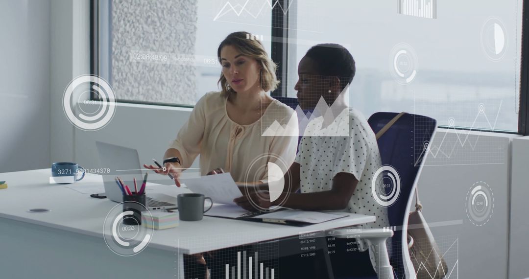 Diverse Business Team Collaborating on Data Analysis in Modern Office