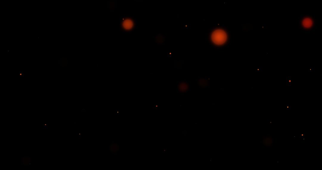 Floating Red Lights on Black Background Illustrating Energy Concept