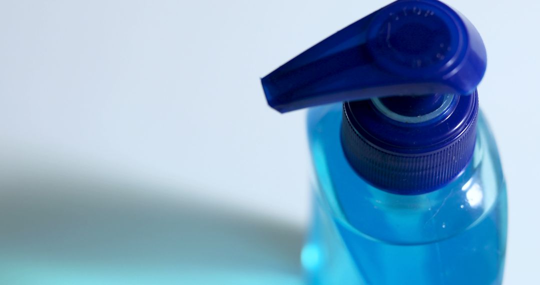 Close-up of Blue Plastic Liquid Soap Dispenser on White Background - Free Images, Stock Photos and Pictures on Pikwizard.com