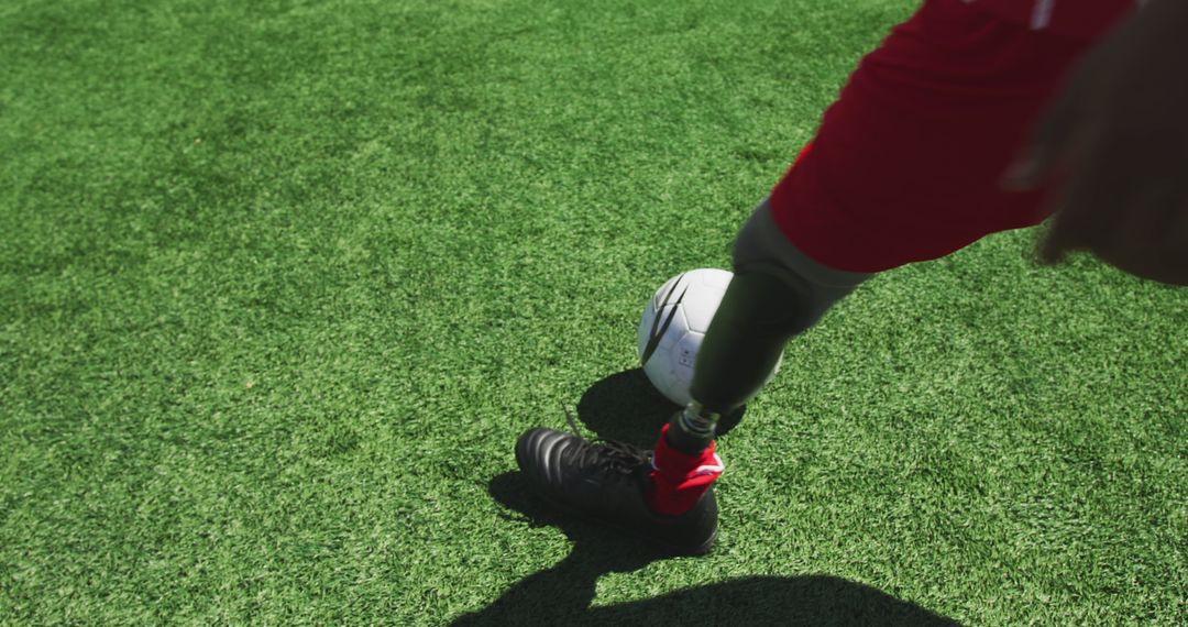 Athlete with Prosthetic Leg Playing Soccer on Turf - Free Images, Stock Photos and Pictures on Pikwizard.com