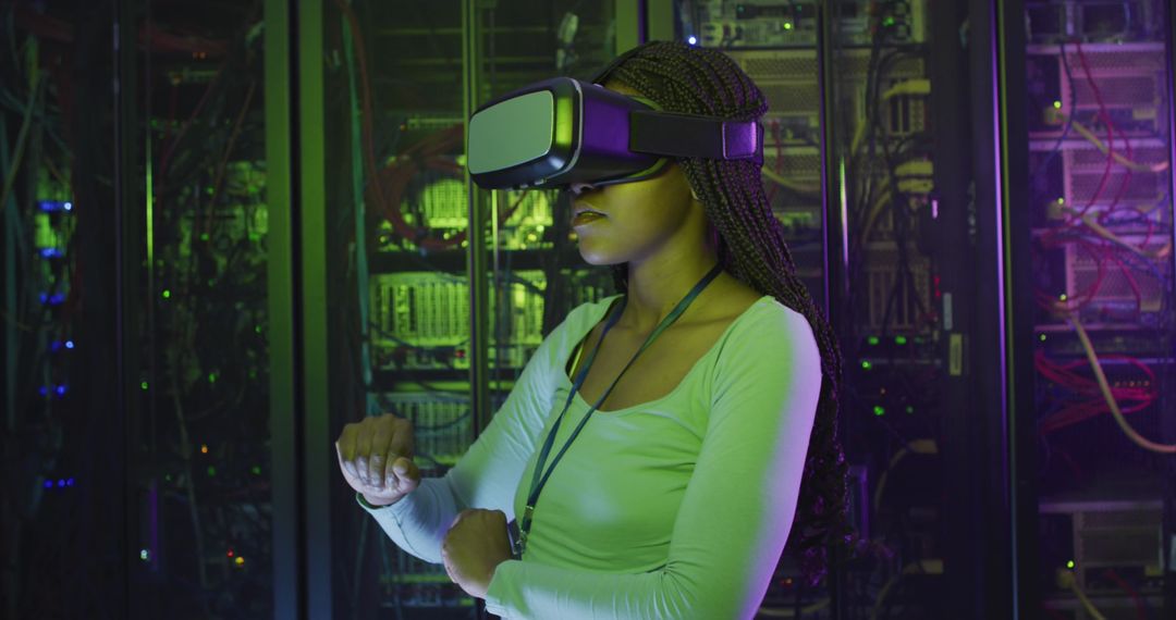 Female IT Engineer Using VR Goggles in a Data Center