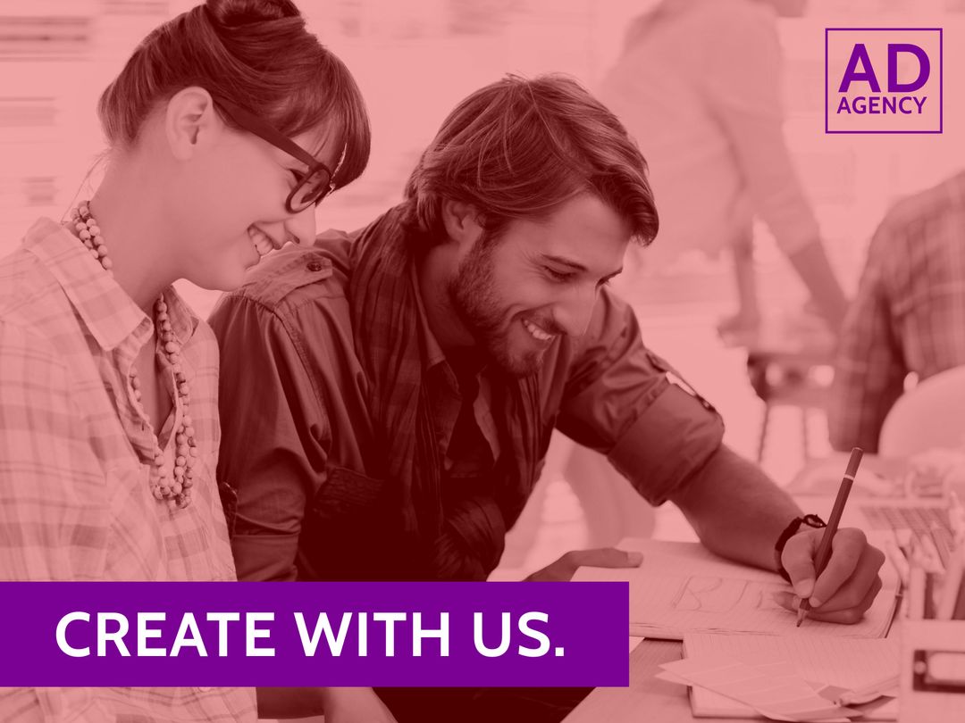 Creative Duo Engaging in Collaborative Work Process