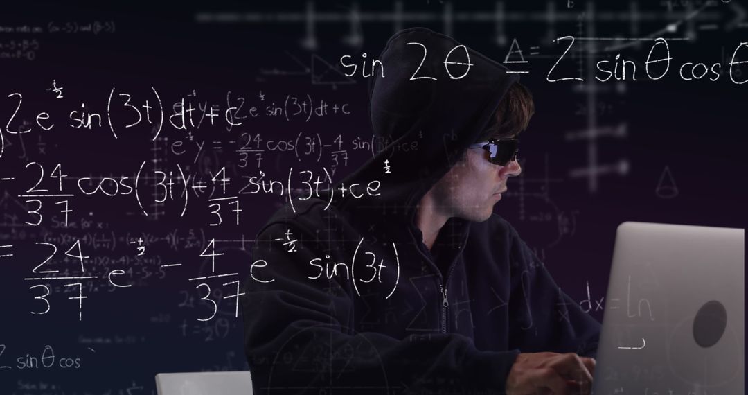 Hacker in Hoodie Using Laptop with Mathematical Formulas Projected