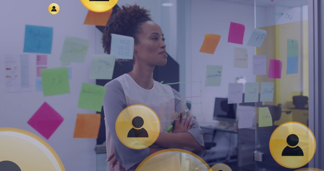 African American Businesswoman Analyzing Office Sticky Notes for Strategy Planning