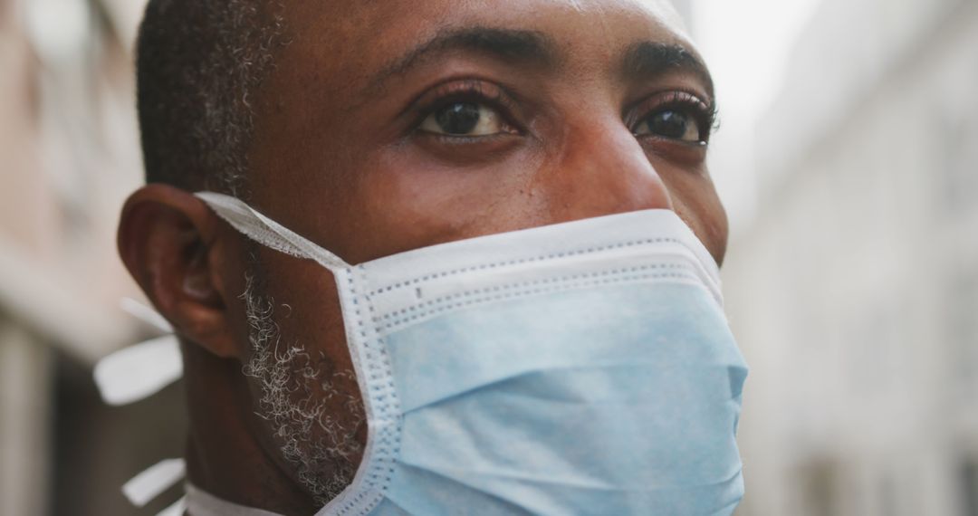 Close Up of Mature African American Man Wearing a Face Mask Outdoors - Free Images, Stock Photos and Pictures on Pikwizard.com