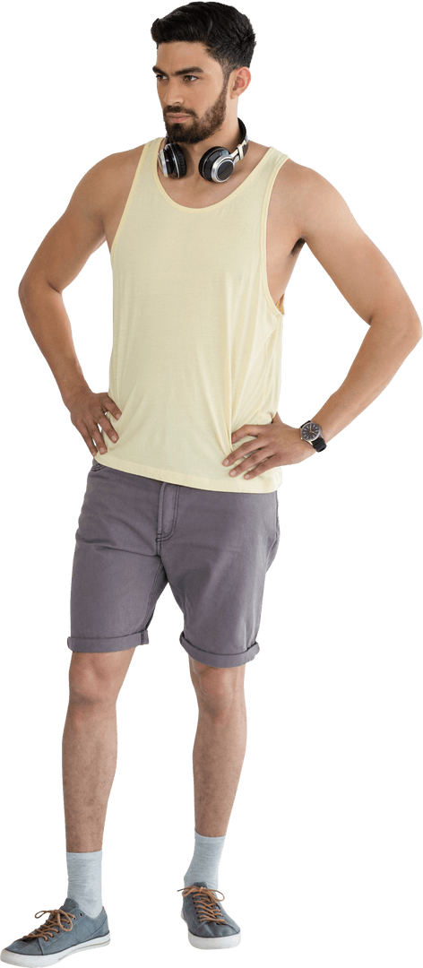 Transparent Image of Man Standing with Headphones and Hands on Hips
