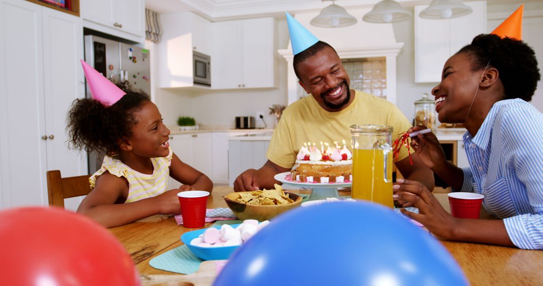 Joyful African American Family Birthday Celebration at Home - Free Images, Stock Photos and Pictures on Pikwizard.com