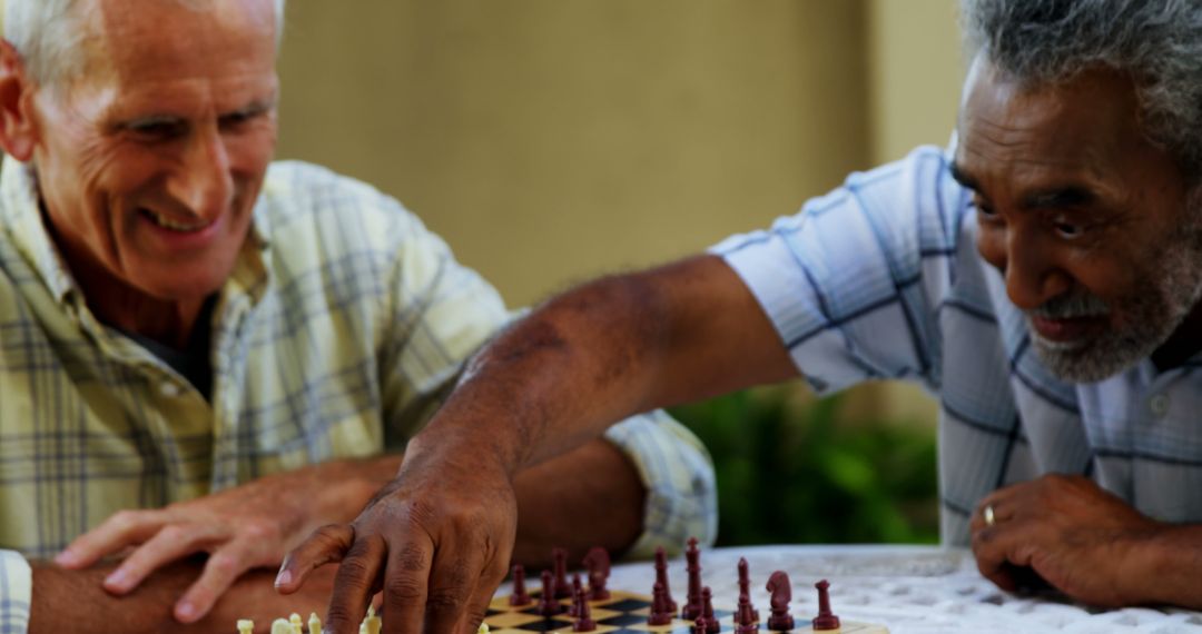 Two Senior Men Playing Chess with Laughs and Joy - Free Images, Stock Photos and Pictures on Pikwizard.com