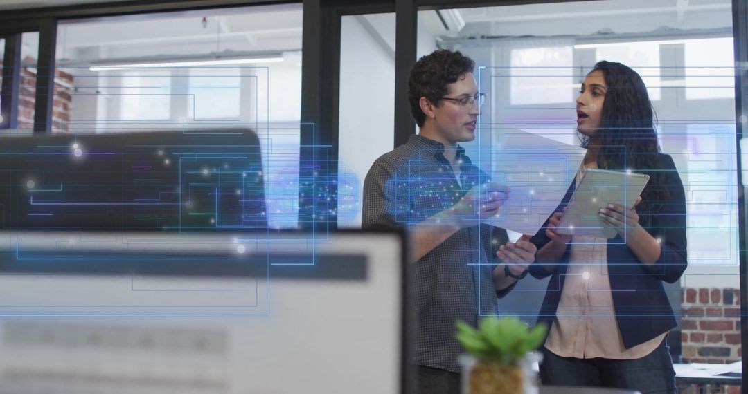 Innovative Business Team Analyzing Key Financial Data in Modern Office