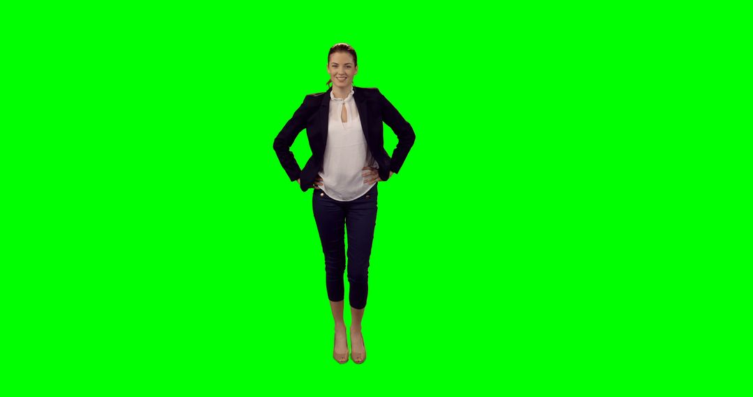 Confident Businesswoman Standing with Hands on Hips on Green Screen - Free Images, Stock Photos and Pictures on Pikwizard.com