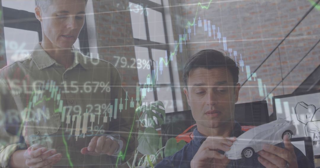 Car Designers Analyzing Data alongside Financial Analytics