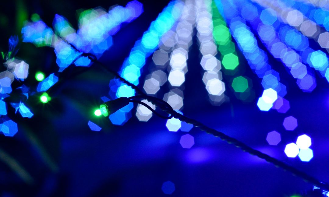 String of Holiday Lights with Colorful Bokeh in Background - Free Images, Stock Photos and Pictures on Pikwizard.com