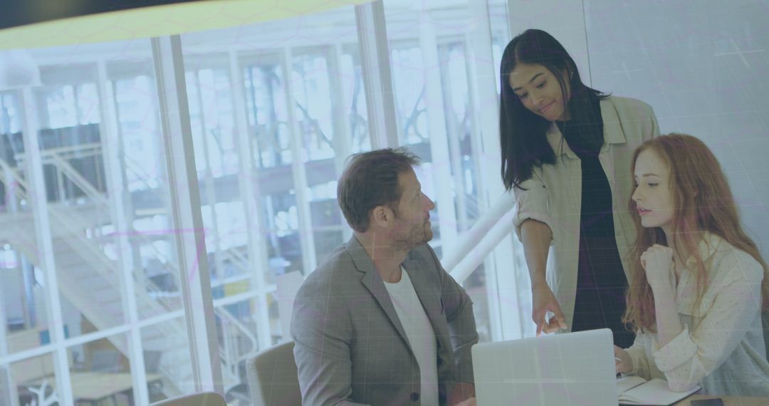 Business Team Collaborating During Meeting in Modern Office