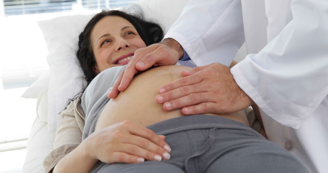 Pregnant Woman Receiving Prenatal Checkup by Doctor - Free Images, Stock Photos and Pictures on Pikwizard.com