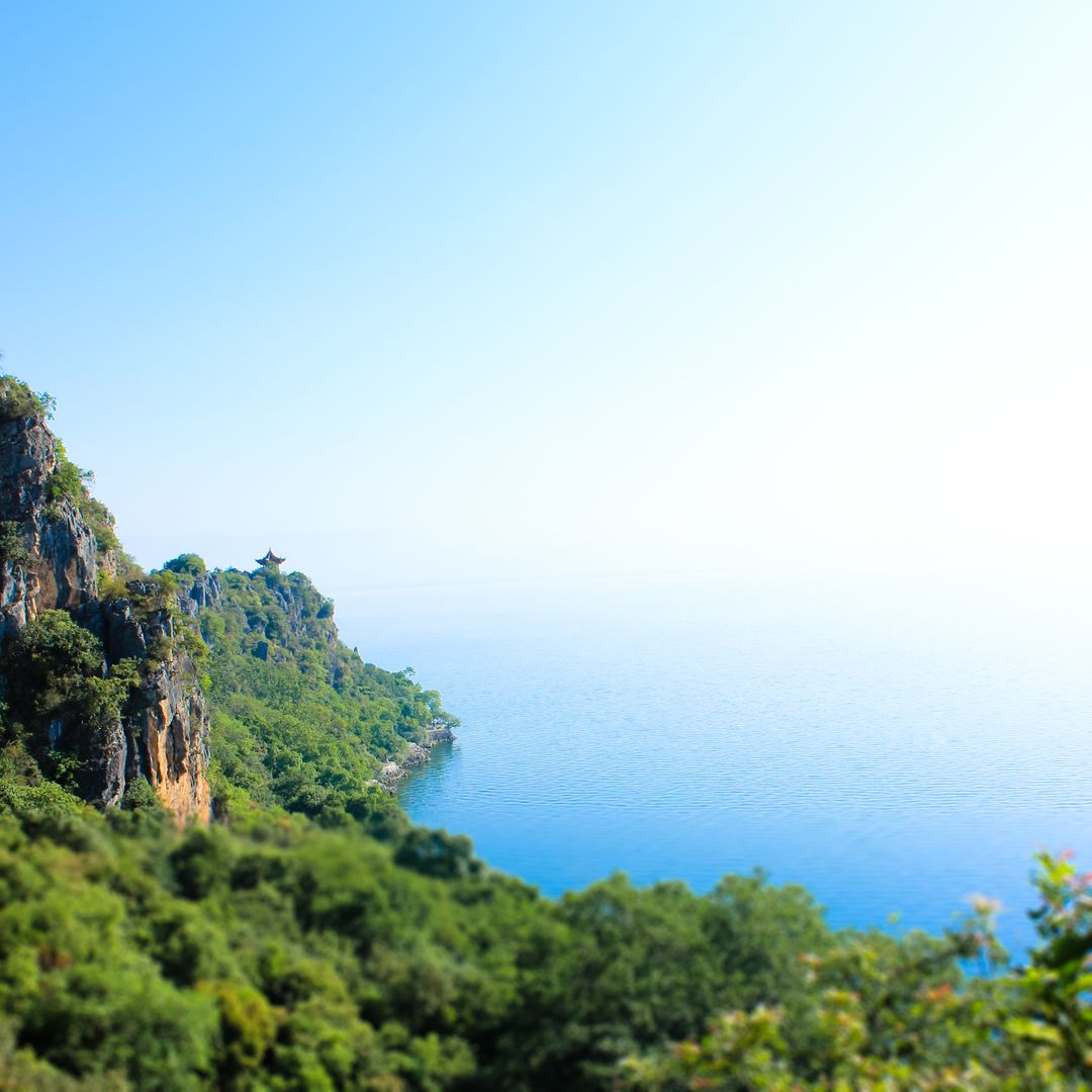 Scenic View of Coastal Cliff with Azure Waters - Free Images, Stock Photos and Pictures on Pikwizard.com