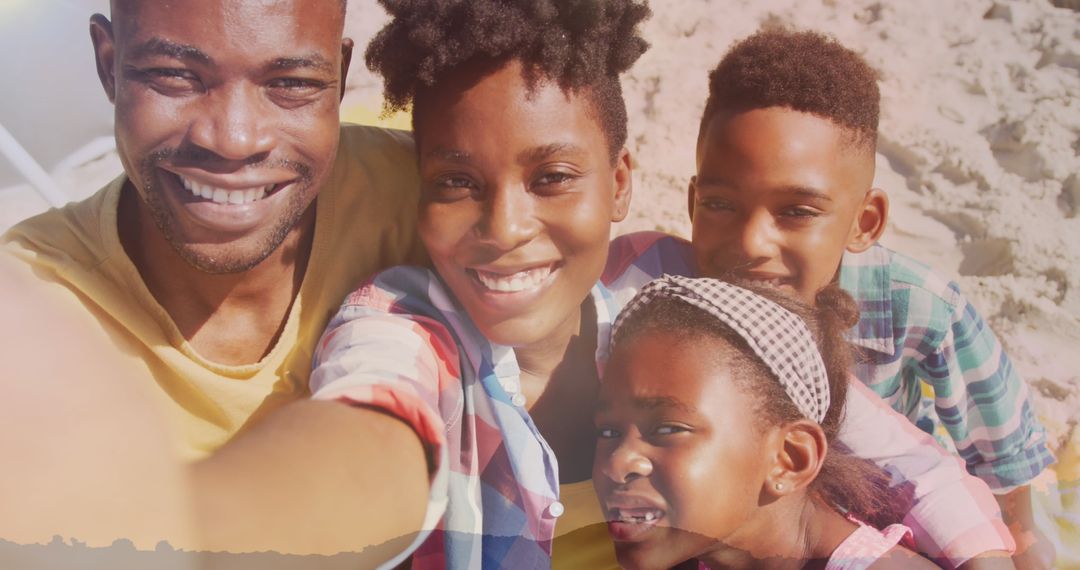Family Smiling While Enjoying Beach Vacation in Sunshine