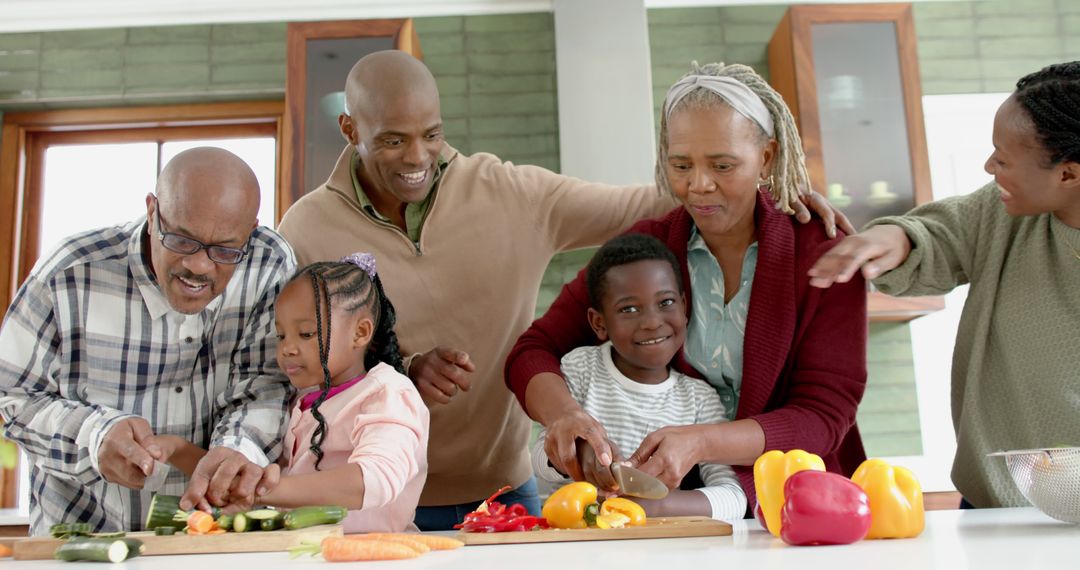 Multi-Generational Black Family Cooking and Smiling Together - Free Images, Stock Photos and Pictures on Pikwizard.com