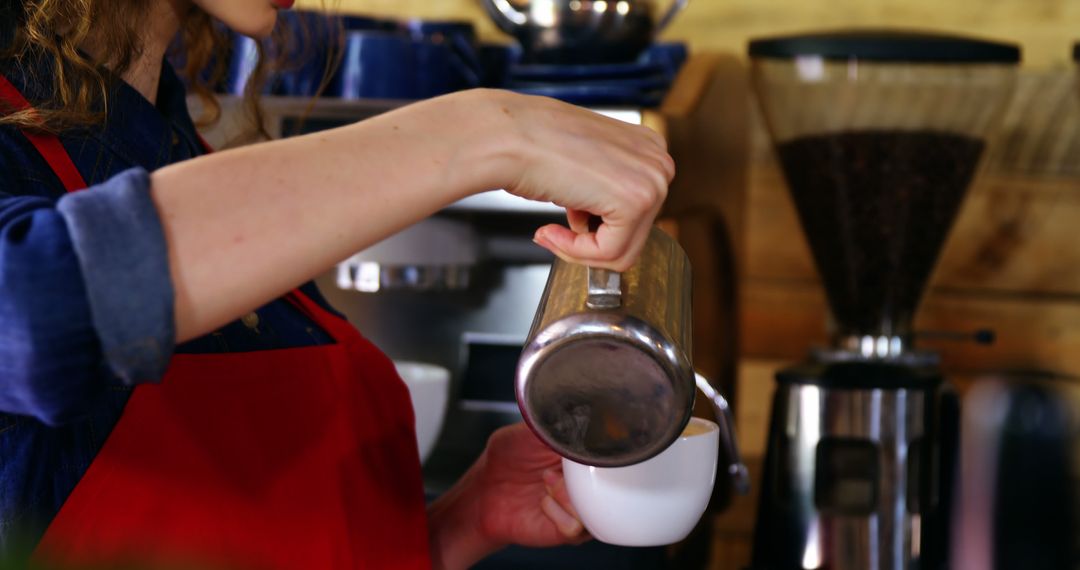 Barista making coffee at cafe - Free Images, Stock Photos and Pictures on Pikwizard.com