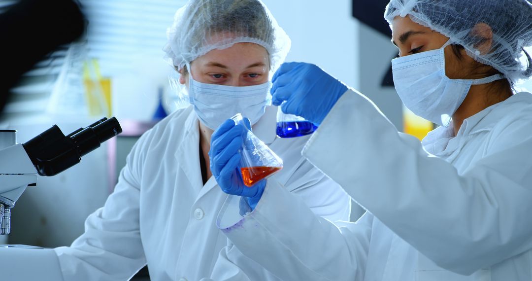 Scientists in a lab examine a sample, with copy space - Free Images, Stock Photos and Pictures on Pikwizard.com