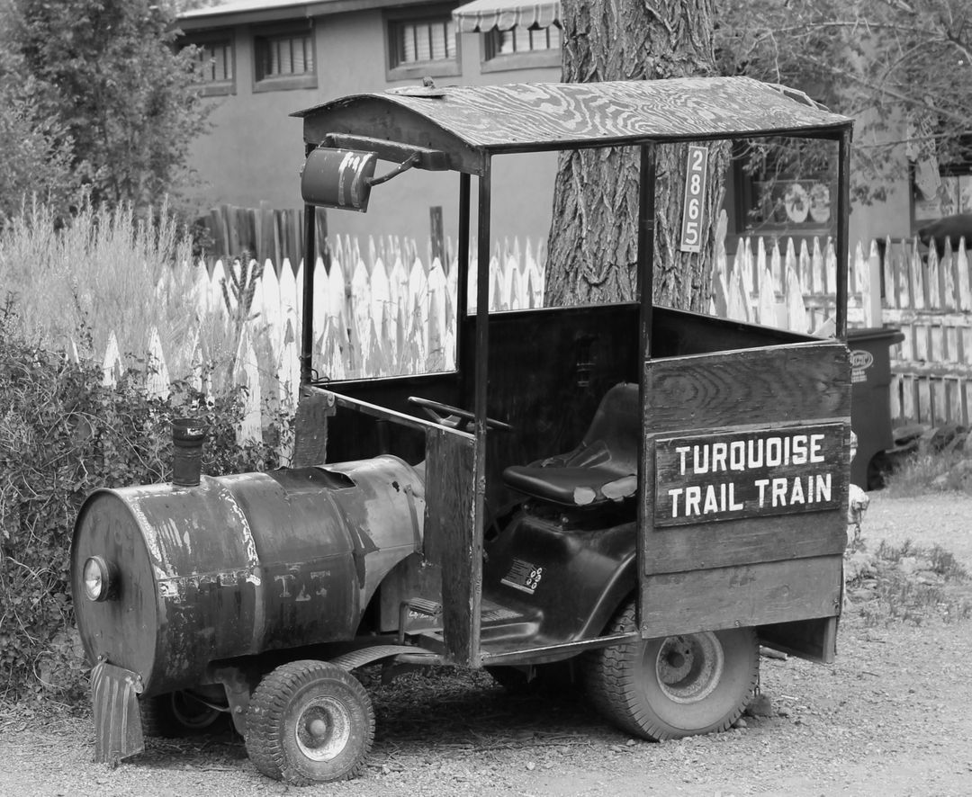 Retro Miniature Train Car Abandoned Near Rustic Fence, Black and White - Free Images, Stock Photos and Pictures on Pikwizard.com
