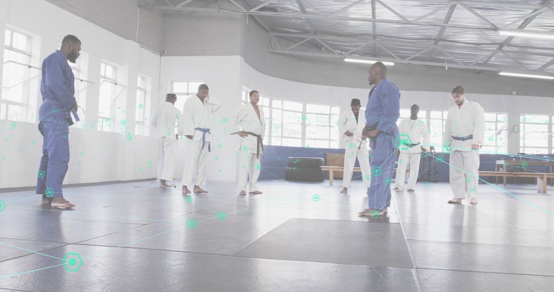 Instructor Leading Brazilian Jiu-Jitsu Class on Mats in Bright Dojo for Team Training