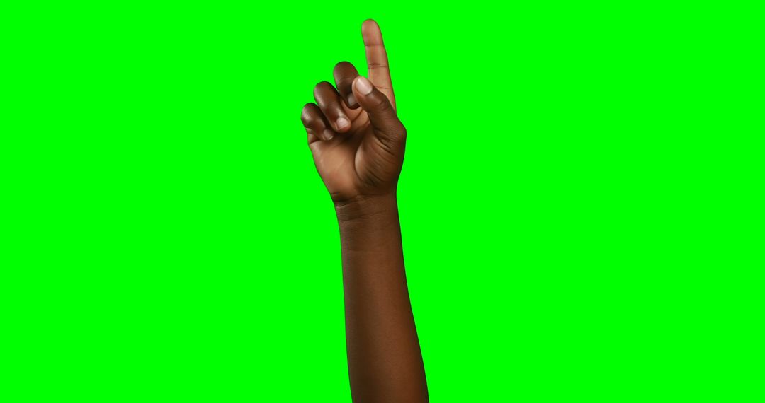 Hand Pointing Index Finger on Isolated Green Background - Free Images, Stock Photos and Pictures on Pikwizard.com