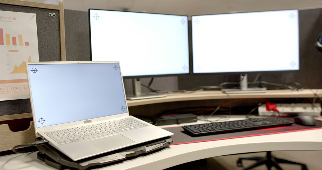 General view of laptop and computers with blank screens in office - Free Images, Stock Photos and Pictures on Pikwizard.com