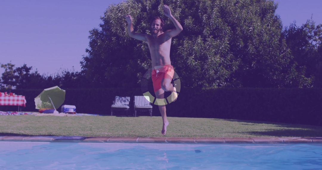 Man in Red Swim Trunks Diving Into Pool in Backyard