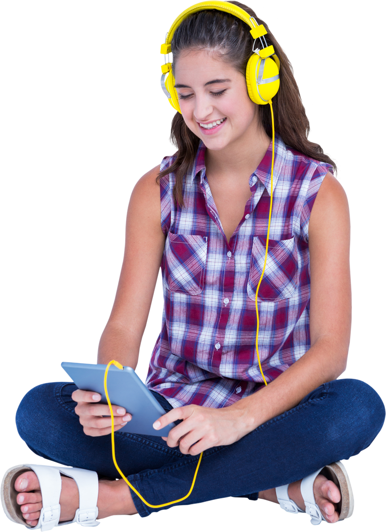 Smiling Young Woman Listening to Music with Yellow Headphones and Tablet on Transparent Background - Download Free Stock Images Pikwizard.com