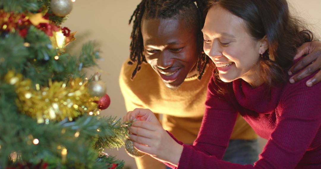 Happy Couple Decorating Christmas Tree Together - Free Images, Stock Photos and Pictures on Pikwizard.com