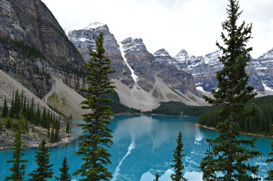 Serene Mountain Lake with Turquoise Waters and Pine Trees - Free Images, Stock Photos and Pictures on Pikwizard.com