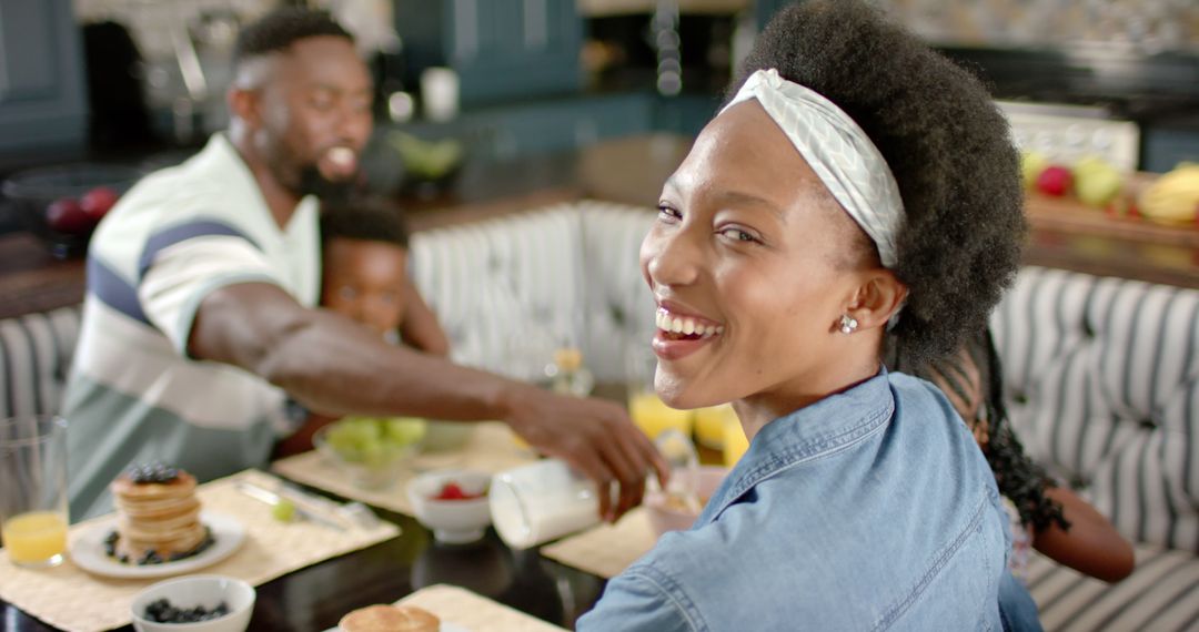 Happy Afro American Family Enjoying Breakfast at Dining Table - Free Images, Stock Photos and Pictures on Pikwizard.com