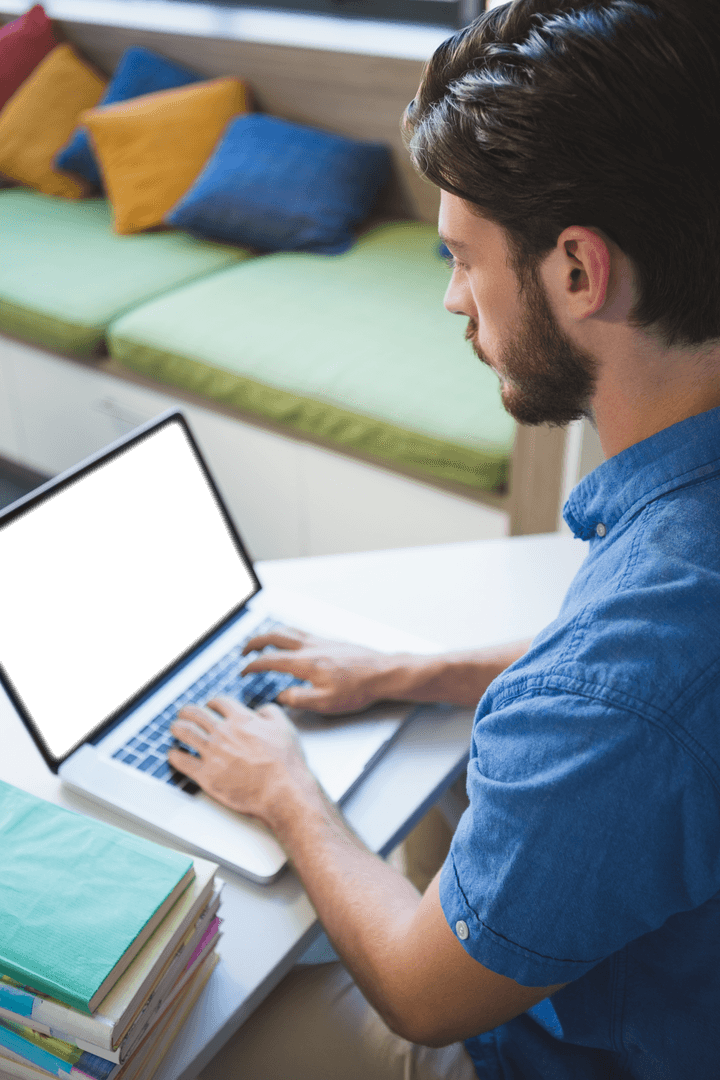 Man transparently using laptop in modern workspace