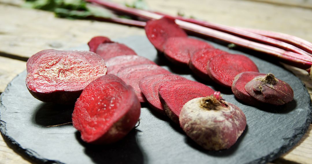 Freshly Sliced Beets on Slate Plate in Rustic Kitchen - Free Images, Stock Photos and Pictures on Pikwizard.com